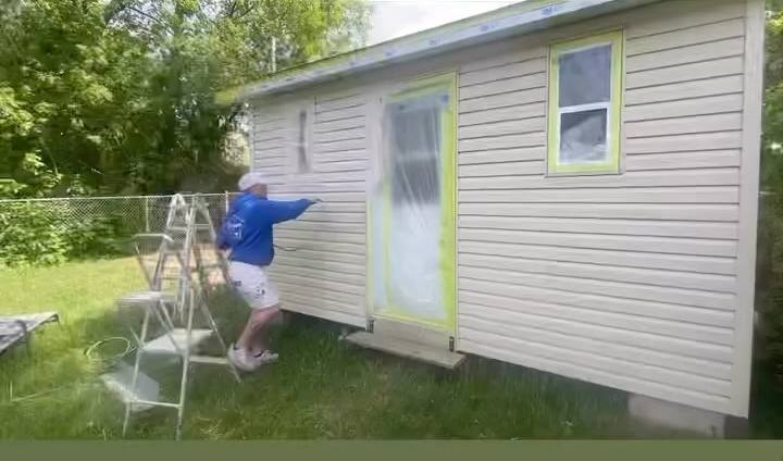 Backyard shed siding, sprayed